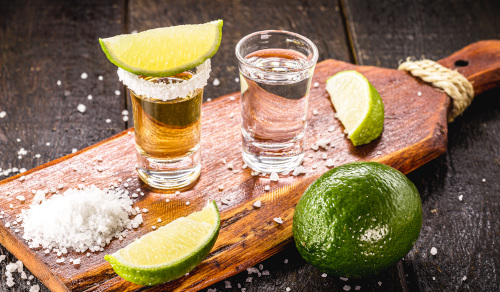 Tequila shooters with salt and lemons